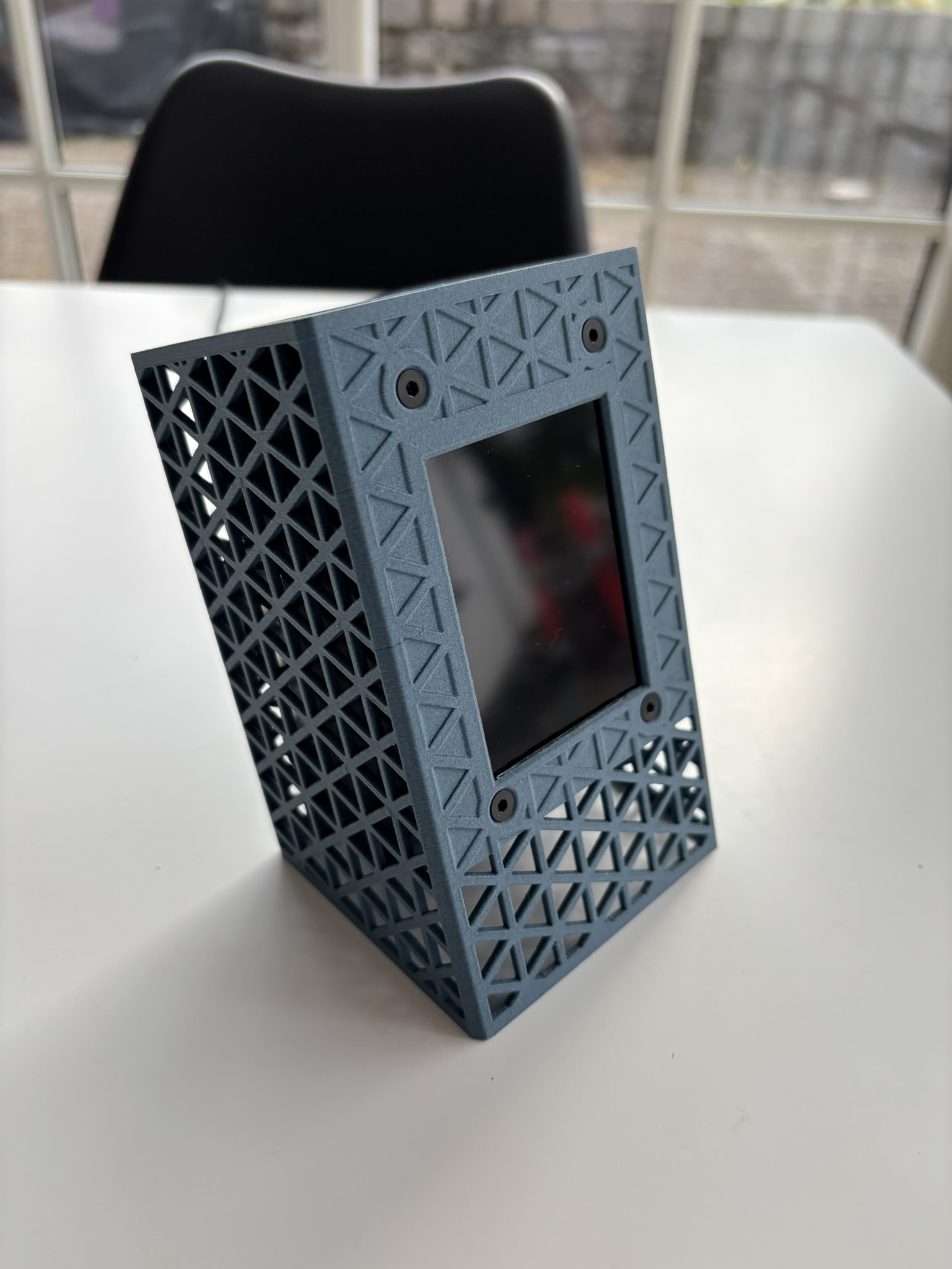 Three-quarter view of the Airnode unit showing front and side geometry.